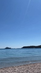 Beach day documented in Prijevor, Montenegro with cider and coastline