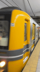 Buenos Aires subway train arrives at station with passengers