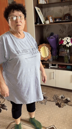 Couple shares morning meal in Bely Yar kitchen