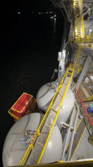 Nighttime footage captures offshore industrial platform near Marina di Ravenna