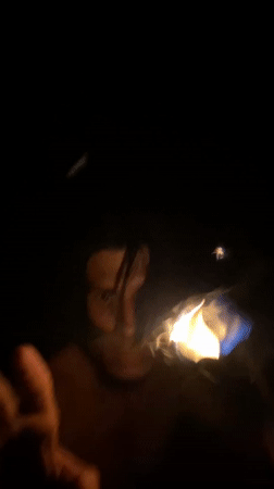 Fire performer demonstrates torch juggling in Venezuelan village