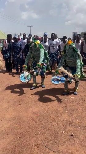 Traditional dancers perform cultural street show in Durimi, Nigeria