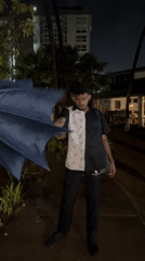 Late-night karaoke and dancing event in rainy Porlamar, Venezuela