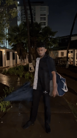 Late-night karaoke and dancing event in rainy Porlamar, Venezuela