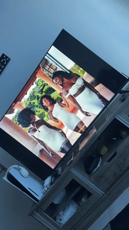 Large TV displays video content in Cape Town entertainment area