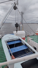 Rowboat spotted on vessel deck in Russian waters