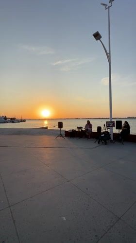 Band performs sunset concert on La Paz waterfront pier