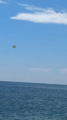 Beach activities and coastal leisure captured at seaside location