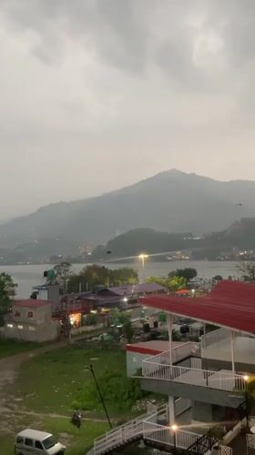 Overcast day captured over Pokhara lake and mountains