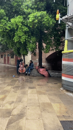 Rainy morning scenes captured across Barcelona's streets and architecture