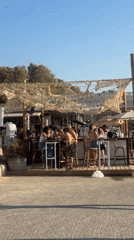 Busy afternoon at Tel Aviv beaches and waterfront cafes