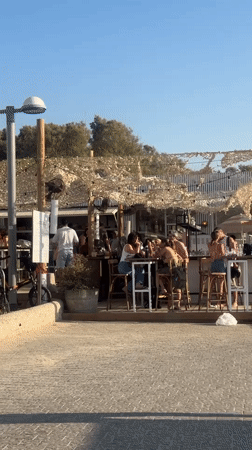 Busy afternoon at Tel Aviv beaches and waterfront cafes