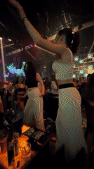 Late night club celebration with dancing and streamers in Burgas