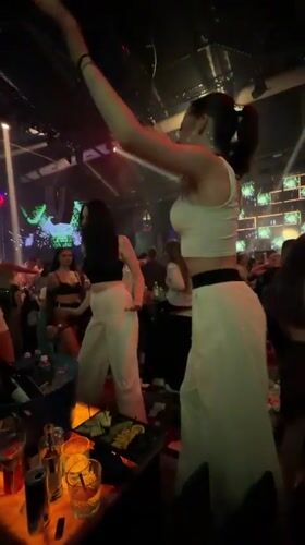 Late night club celebration with dancing and streamers in Burgas