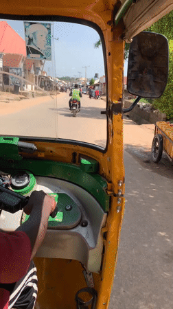 Auto-rickshaw ride documented in Abuja streets