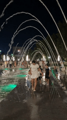 Shymkent park comes alive with lights and people at night