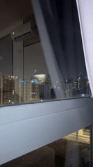 Quiet urban life documented through Kuala Lumpur windows