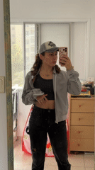 Woman takes mirror selfies in Kiryat Bialik, Israel