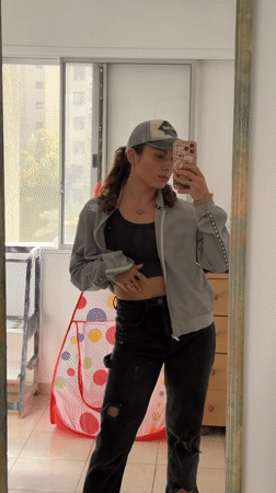 Woman takes mirror selfies in Kiryat Bialik, Israel