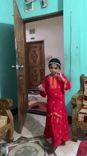 Red dress, teal room: multiple angles on a Dhaka morning