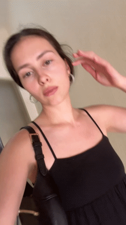 Young woman observed in hallway in Abu Dhabi