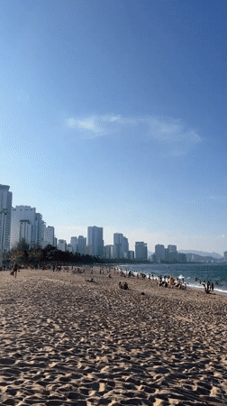 Busy beach scene documented in Nha Trang, Vietnam