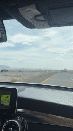 Desert highway drive through California's high desert.