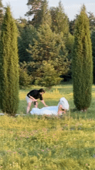 Outdoor field session mixes meditation, photography, and bridal portrait work.