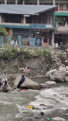 River activities and town exploration in Old Manali