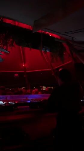 DJ performs at nighttime club venue in Montanejos, Spain