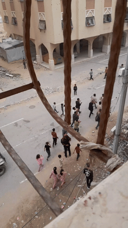 Community gathering observed in Khan Yunis amid urban destruction