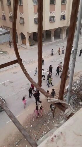 Community gathering observed in Khan Yunis amid urban destruction