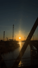 Sunset captured over Port of Antwerp industrial landscape