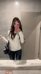 Woman takes bathroom selfies in Nan'an District restroom