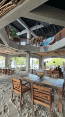 Beachside restaurant and BMW motorcycle in Gerokgak, Bali