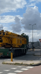 Crane truck and parking control vehicle spotted in Amsterdam