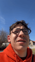 Man discusses Cyprus travel plans in Bulgarian countryside