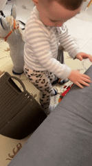 Toddler photographed indoors in Akulovo, Russia