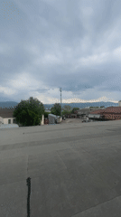Overcast rooftop view across Krasnoyarsk's urban and industrial sprawl