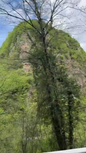 Mountain landscape filmed from moving vehicle in Georgia
