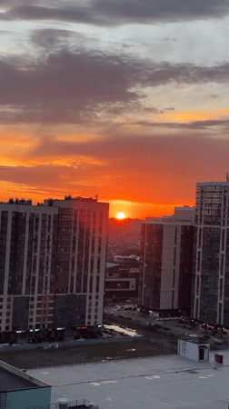 Dramatic sunset illuminates Krasnodar skyline, Russia