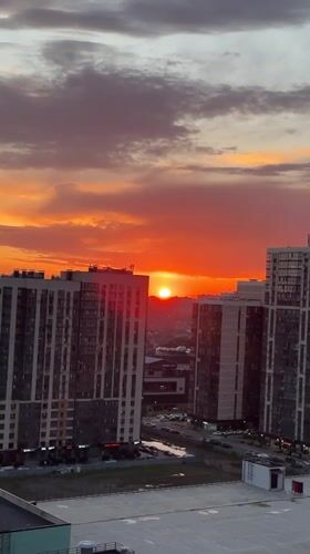Dramatic sunset illuminates Krasnodar skyline, Russia