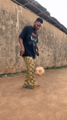 Man practices soccer skills in Ikorodu yard