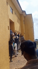 Crowds gather at ICT Centre building in Keffi, Nigeria