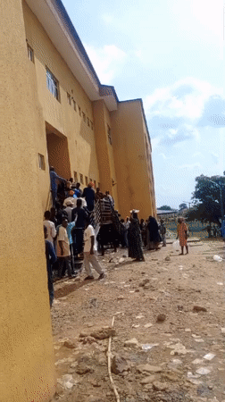 Crowds gather at ICT Centre building in Keffi, Nigeria