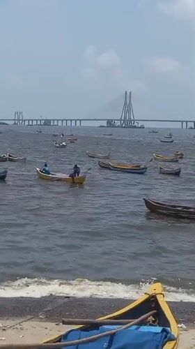 Morning fishing boats active near Mumbai's Bandra-Worli Sea Link