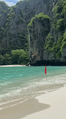 Limestone-framed bay beach with turquoise water, Ao Nang