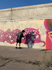 Khabarovsk waterfront at sunset: graffiti, river views, and street life