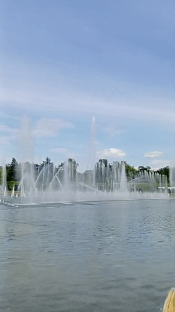 Families enjoy water fountains at Wrocław's Centennial Hall park