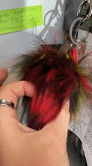 Acrylic nails and a fluffy keychain, tagged #Toys in Anapa